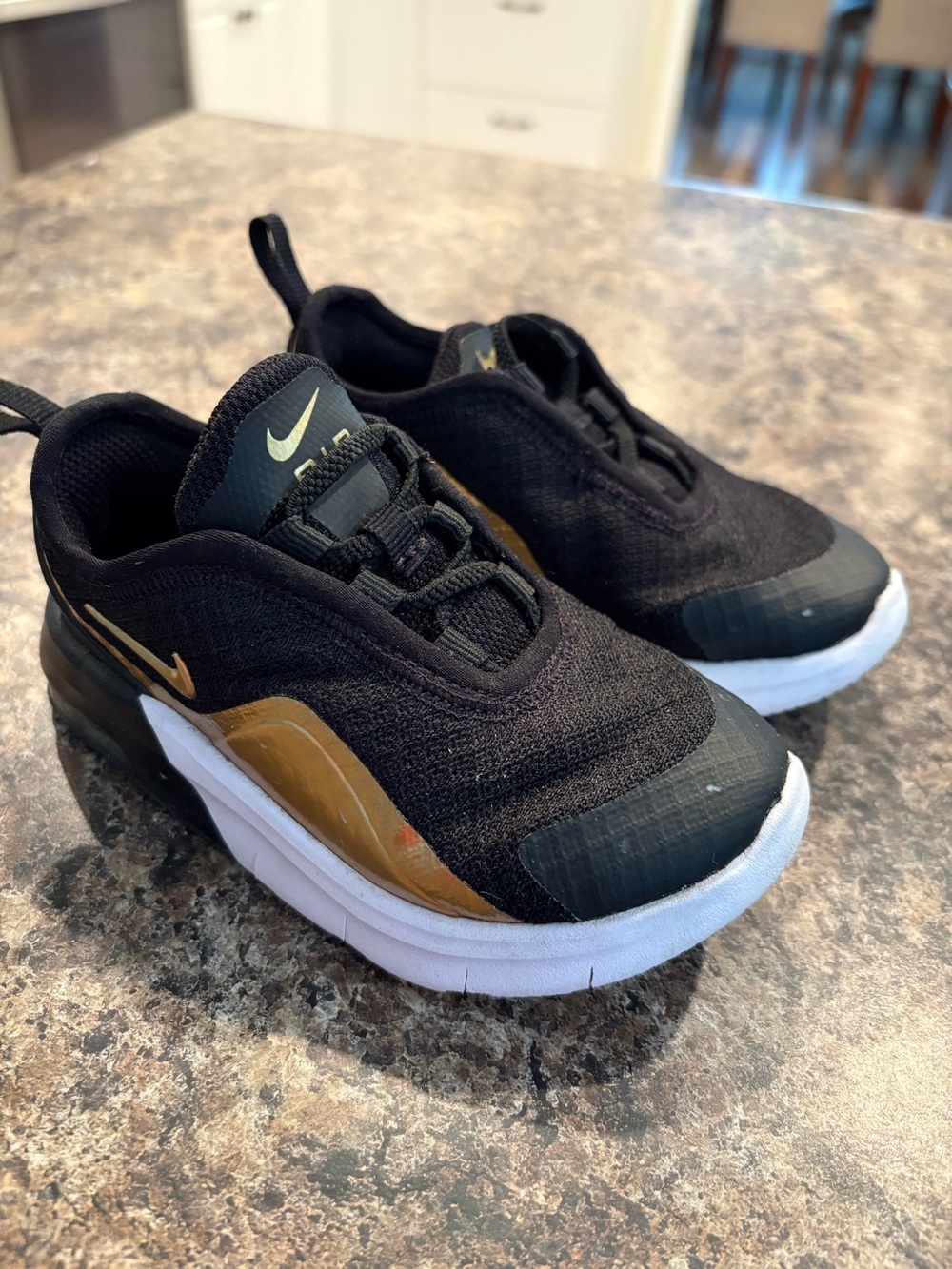 Nike Air Kids Black and Gold Slip On Sneakers Size 7C